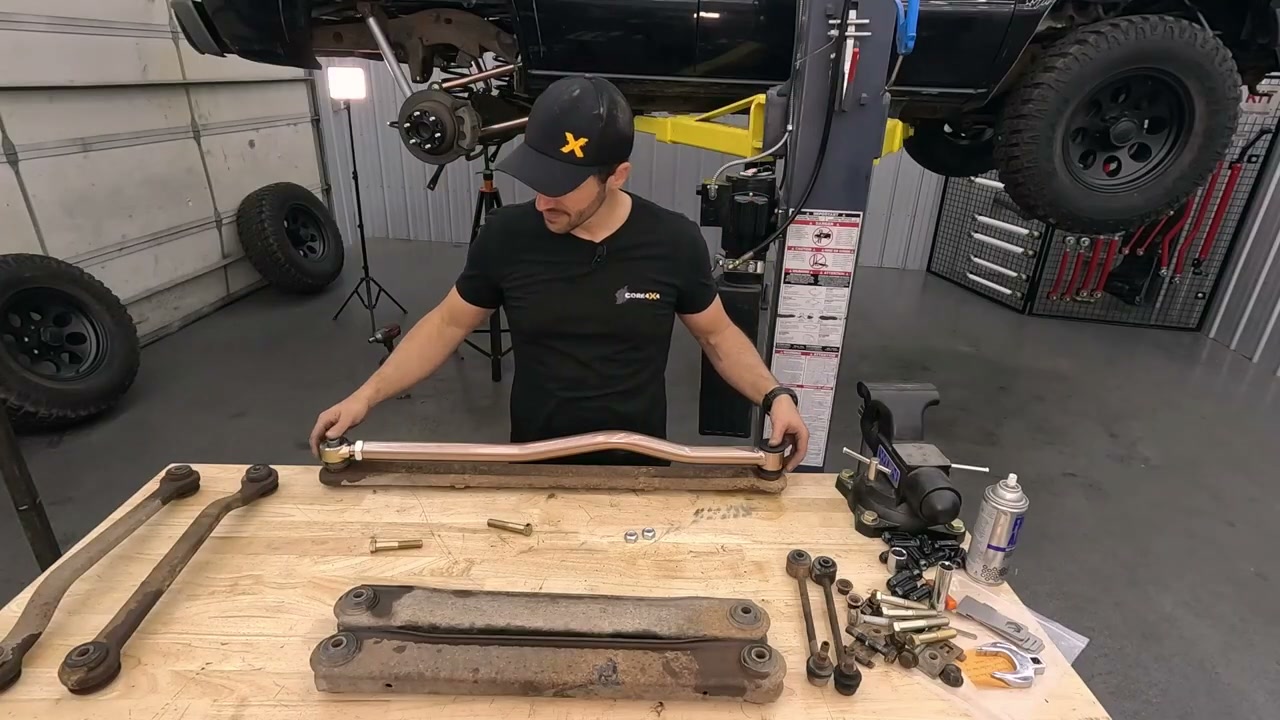 Prepping the Core 4x4 adjustable rear track bar on the bench before installing it in the Chevy Tahoe